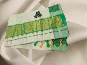 Kerala Tissue Kasavu Saree with floral designs